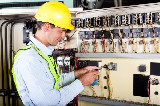 An electrical engineer may supervise equipment installation at building sites.