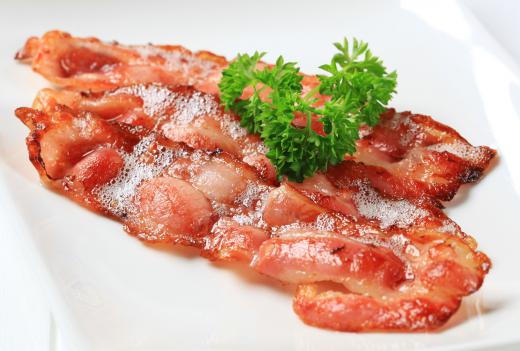 Short order cooks often prepare breakfast meats such as bacon.