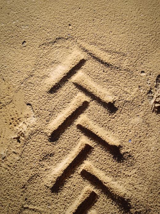 Tire tracks are analyzed during a forensic investigation.