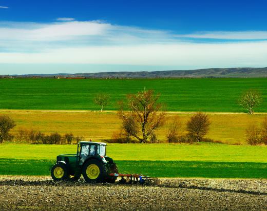 An agricultural contractor provides some service to the farming industry.