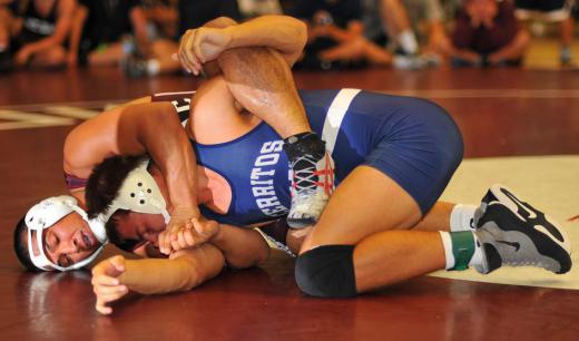 A college recruiter may be interested in recruiting student wrestlers.