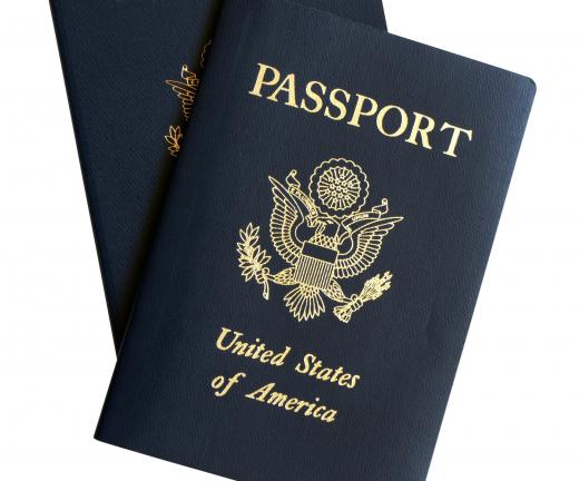 A tour guide may help travelers with passports and other travel documents.