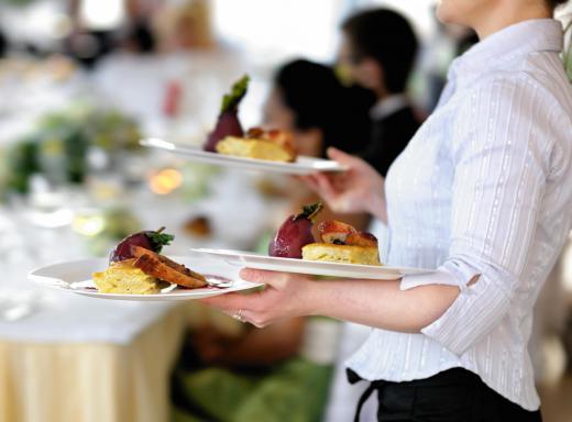 A waitress must be able to carry heavy plates without dropping them.