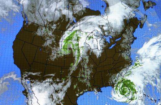 Weather maps, which are used by TV meteorologists, show storm systems across the US.