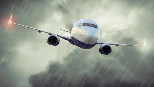 An airline dispatcher helps a plane's captain bring the flight in safely during an emergency.