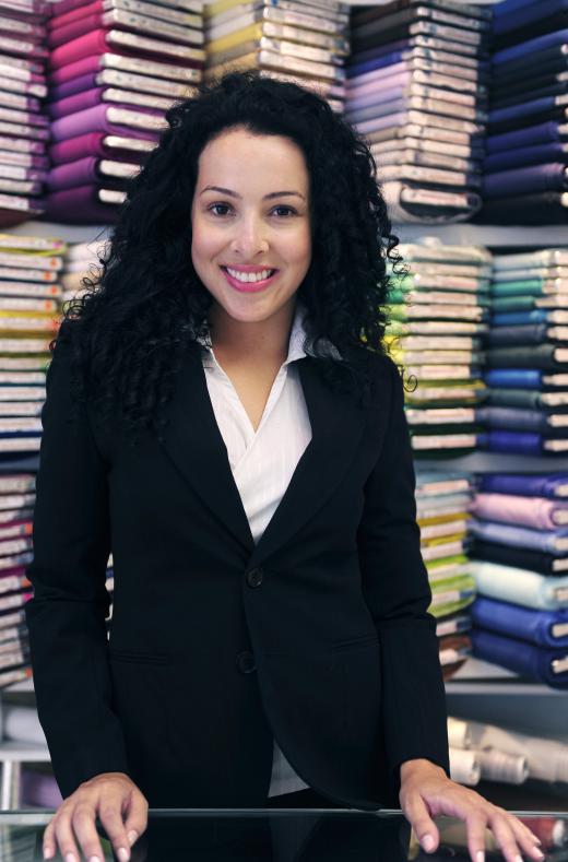 Sales representatives work with fashion buyers for retail stores.