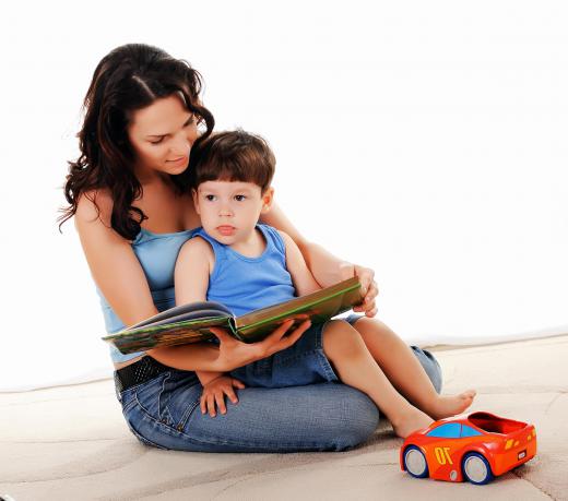 Nannies provide direct care to children, including activities such as reading.