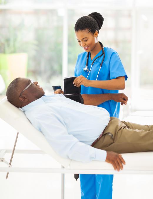 A urology nurse checks vital signs and performs basic physical examinations.