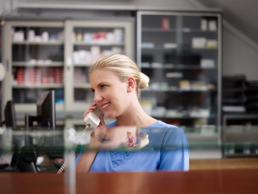 A medical office administrator is responsibe for answering phones and handling patient files in a medical office.