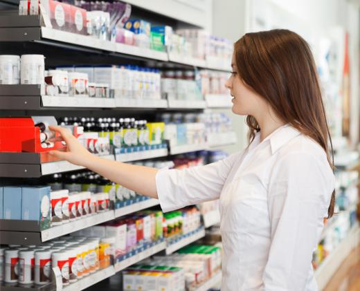 Pharmacy directors make sure medications are properly labeled and organized in store shelves.