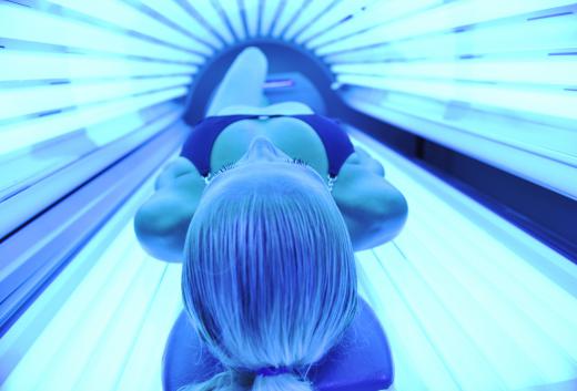 There are many duties at tanning salons, including cleaning the beds in between customers.