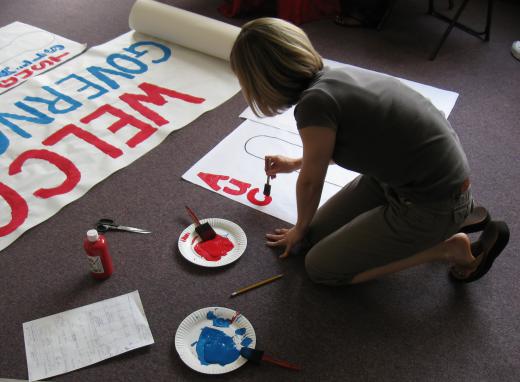 A campaign manager delegates tasks to volunteers who want to support a particular political candidate.