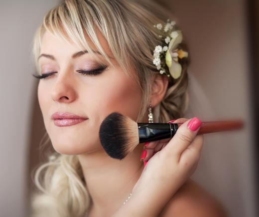 A cosmetic sales representative may do makeovers on customers in the hopes of persuading them to buy the products.