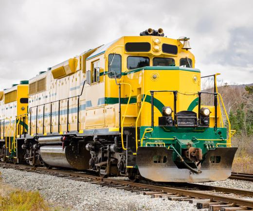 Engineers control the operations of a train from the enclosed cab of a locomotive.